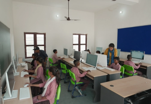 Students engaging in new learning opportunities with improved educational facilities and resources.