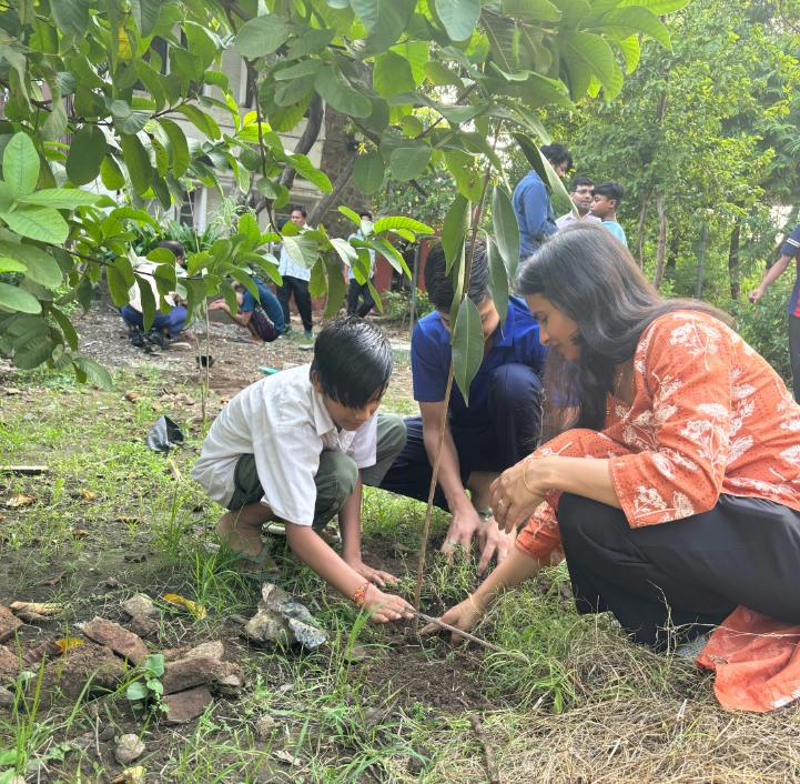 Students actively engaged in a classroom setting, reflecting a vibrant learning environment.